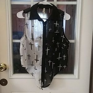 Half black/half white sheer cross, sleeveless top.
